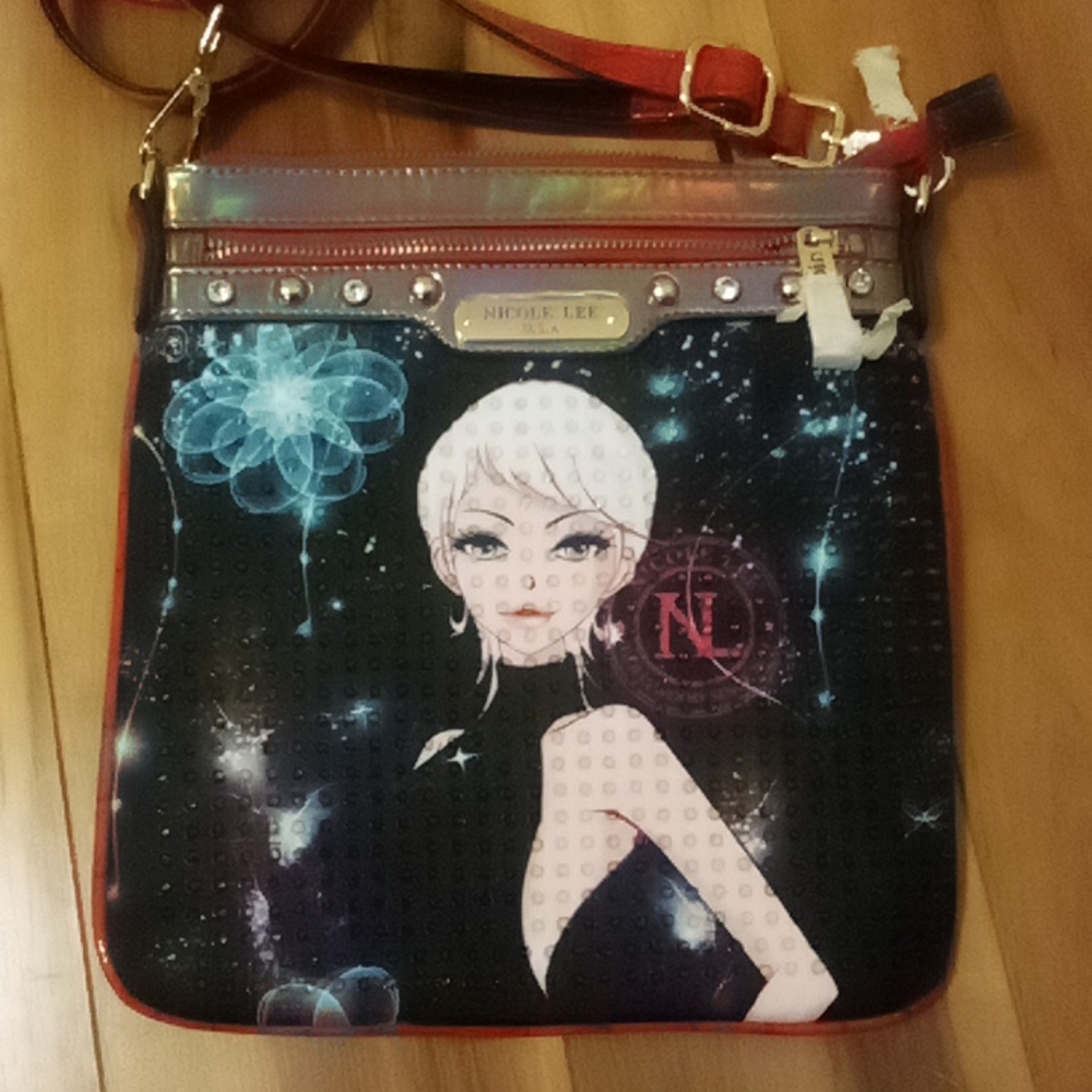 Woman's Nicole Lee hand bag